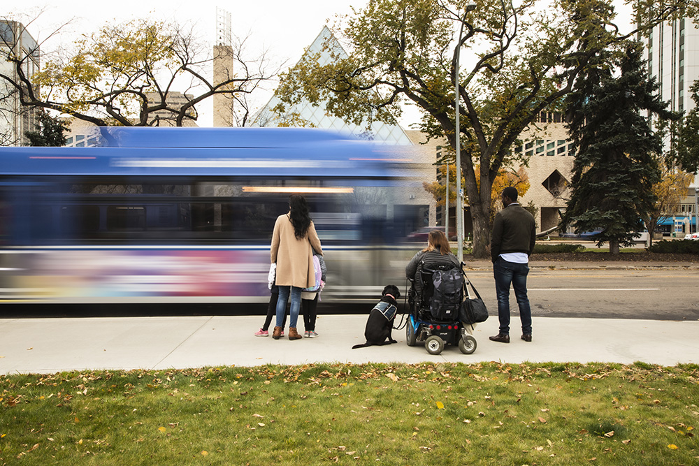 ETS Accessible Campaign Promotional Image featuring people waiting for a bus.