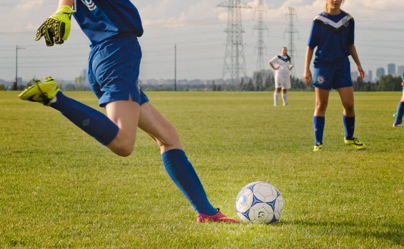 Soccer player kicking a ball