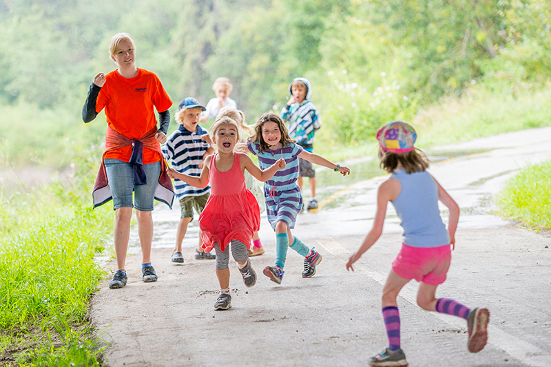 kids playing in the river valley trail