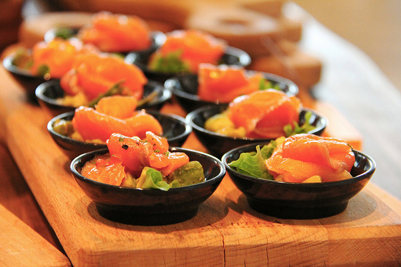 A tray of catered salads