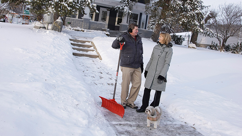 persons standing on shovelled stairs